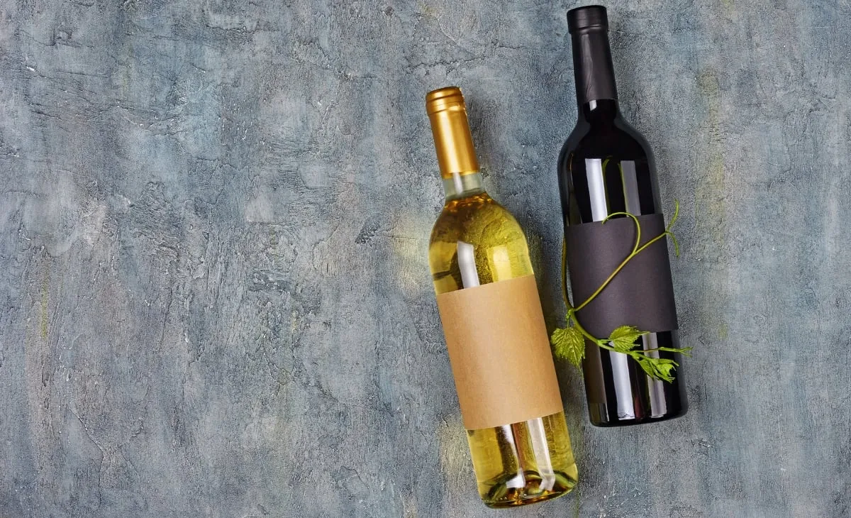 two wine bottles with no labels